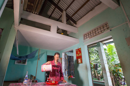 Photo by Lisa Murray for CRS Phuoc and her 84-year-old mother now have an improved quality of life thanks to a fortified mezzanine section of their home they share in the coastal Quang Nam province.