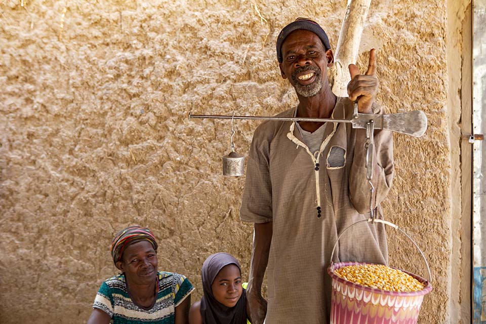 weighing grain in Mali