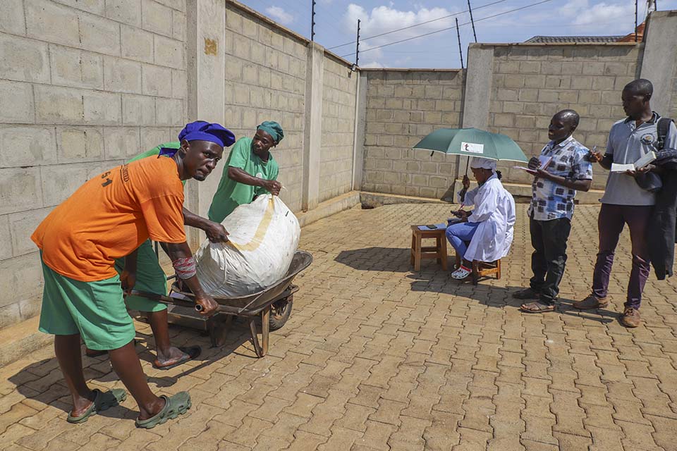 weighing vanilla in Uganda