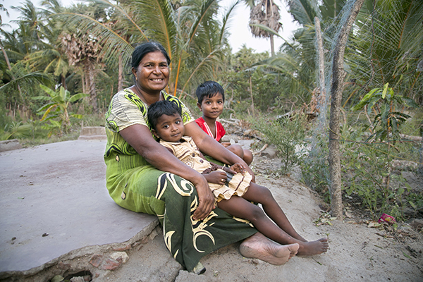 woman with grandchildren in Sri Lanka