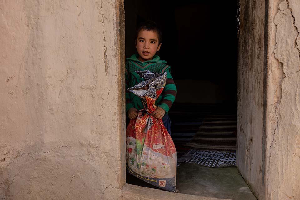 young Afghan boy facing camera
