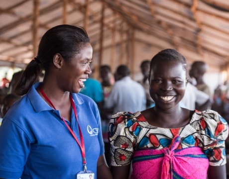 People wait to be processed at UNHCR Refugee Verification Center in the Bidi Bidi Refugee Settlement.