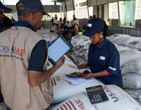 CRS and USAID emergency response team discussing COVID-19 response.