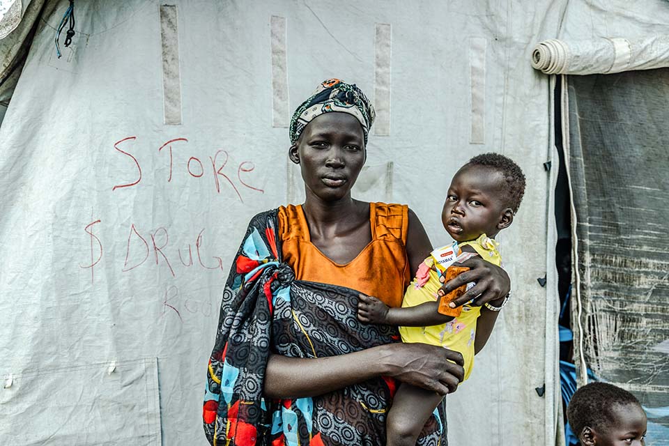 mother holds child in South Sudan