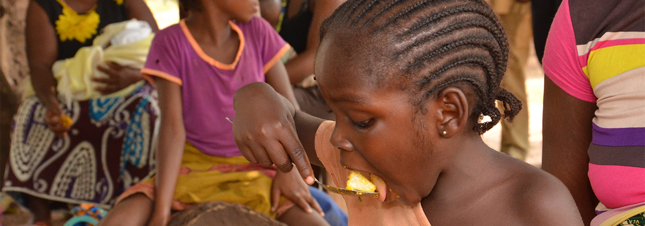 A child eats a nutritious meal in Africa. Photo by Michael Stulman/CRS