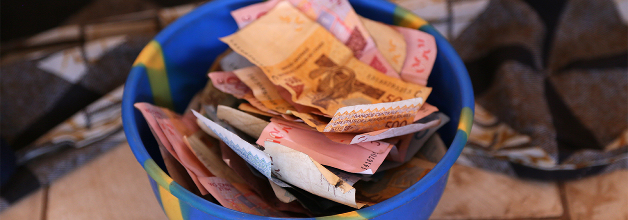 Savings and Internal Lending Communities (SILC) provide access to capital for people who cannot afford loans. Photo by Michael Stulman/CRS