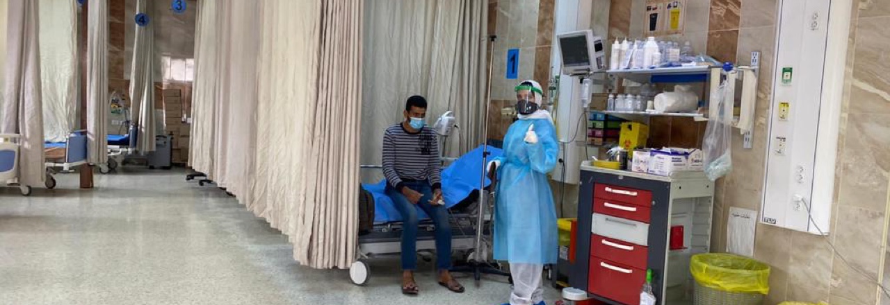 Healthcare worker helping patient