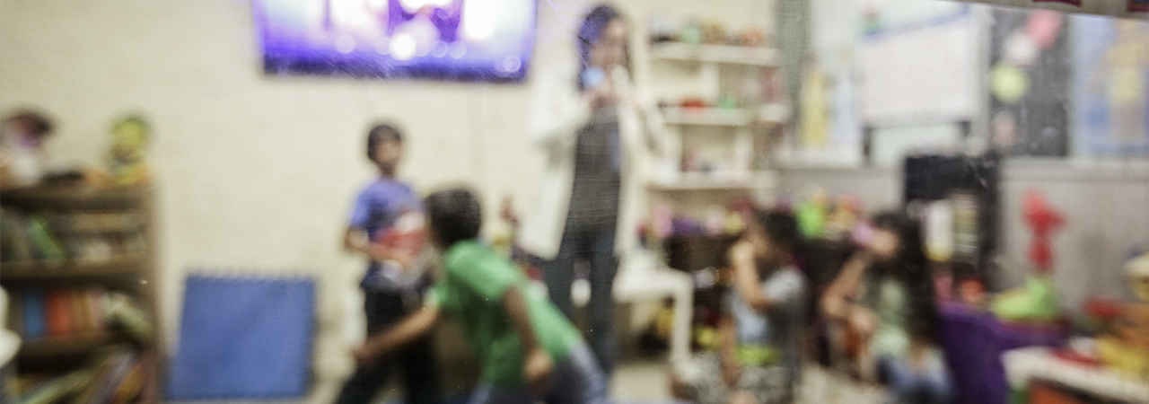 Honduran children at a play space at the House of Charity, a home for migrants at “Monseñor Luis Morales” Reyes in San Luis Potosi municipality, San Luis Potosi state, México. Photo by Oscar Leiva/Silverlight for CRS