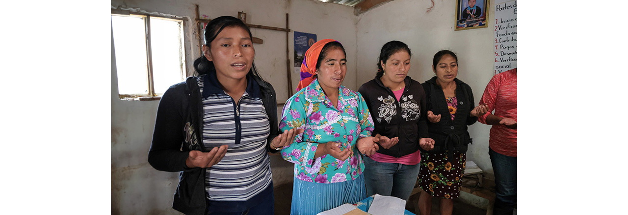 A group of women praying