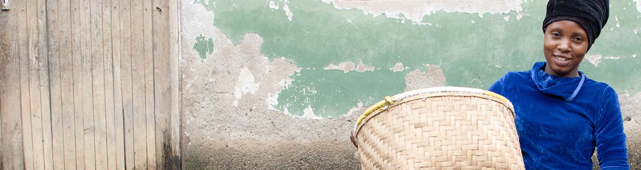 woman holding basket in Tanzania