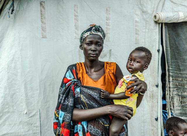 woman holding baby