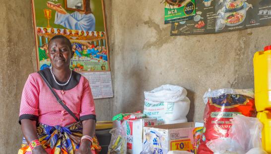 woman tending her market shop