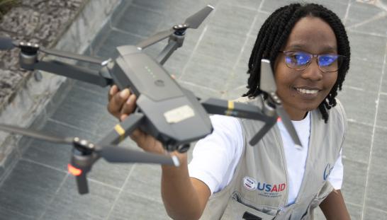 woman holding drone