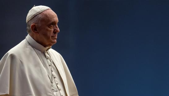 Pope Francis with a dark blue background