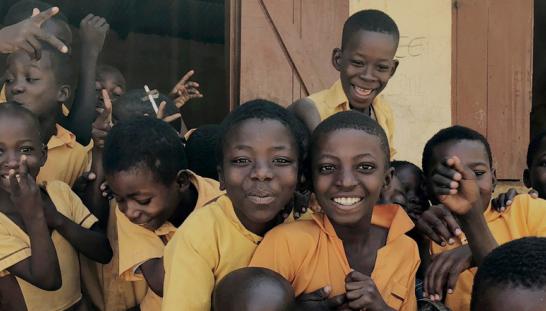 Children in front of a building.