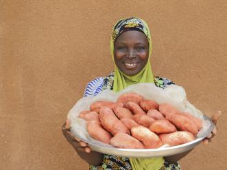 close portrait of smiling woman in Benin