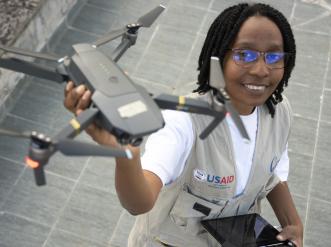 woman holding drone