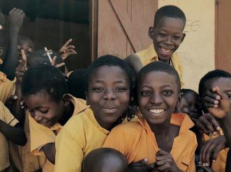 Children in front of a building.