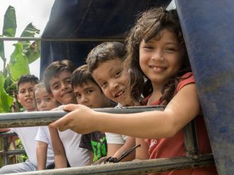A group of smiling children.
