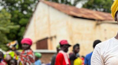 woman carrying basket of beans in Central African Republic