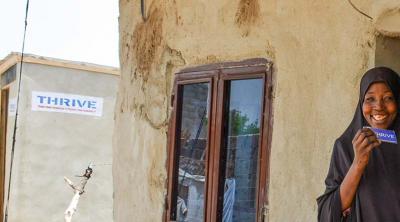 couple outside home in Nigeria