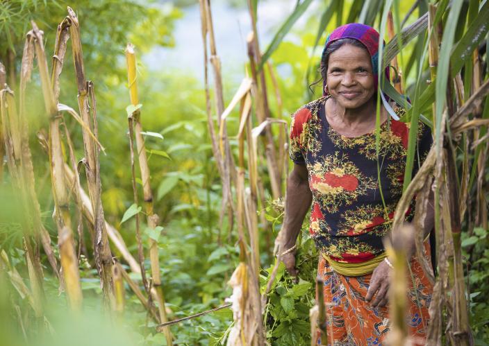 woman in field in Nepal