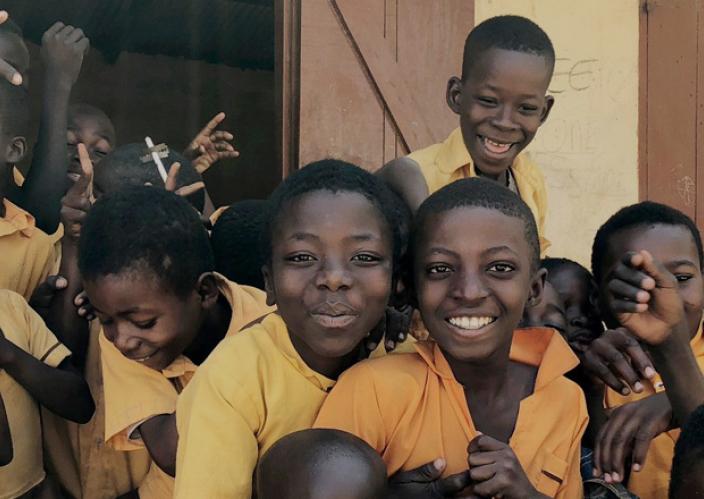 Children in front of a building.