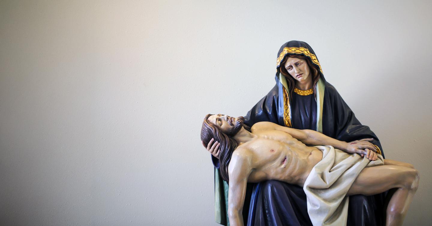 A statue depicting the Lady of Sorrows holding the body of Jesus.