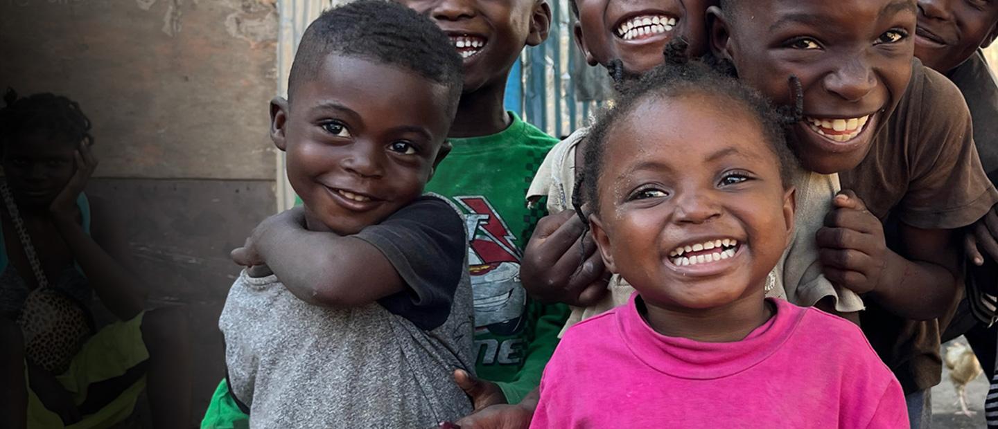 Children smiling.