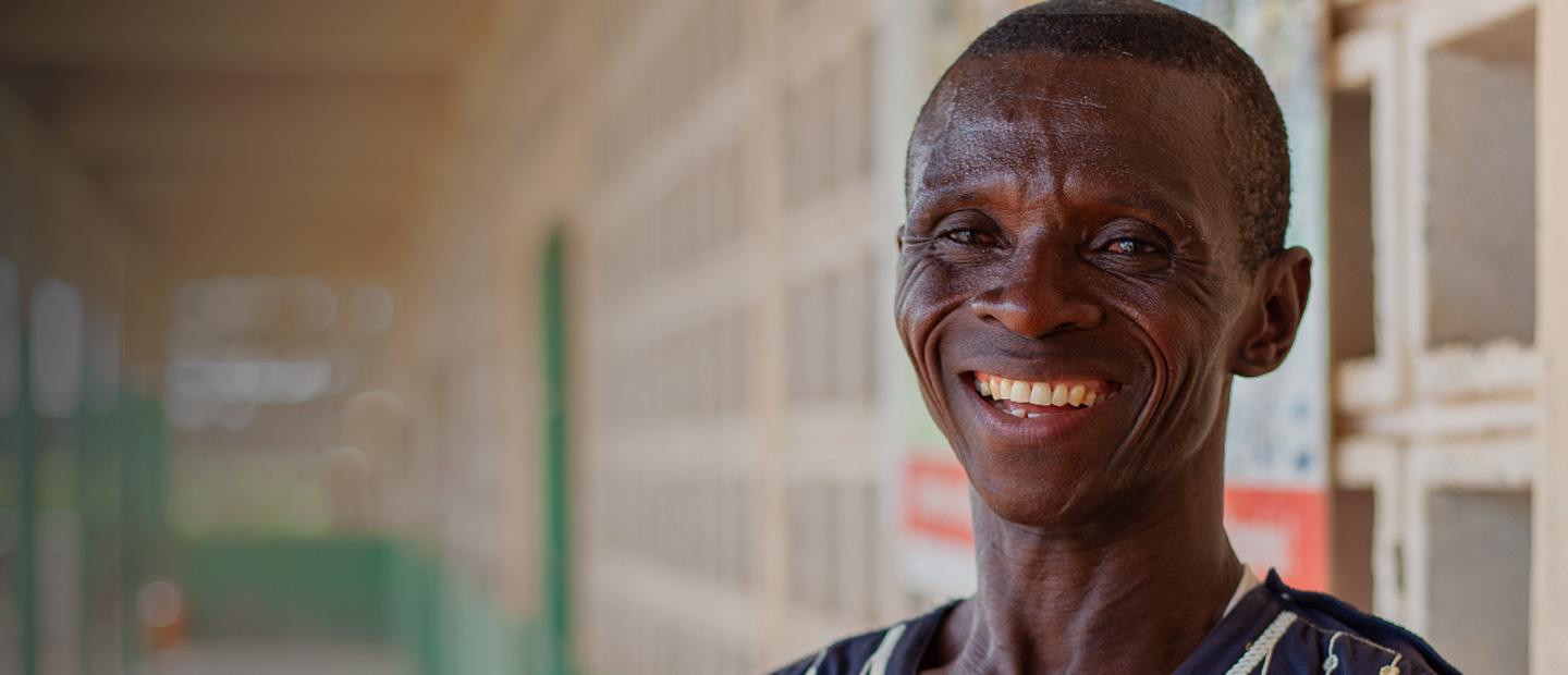 A man smiling.