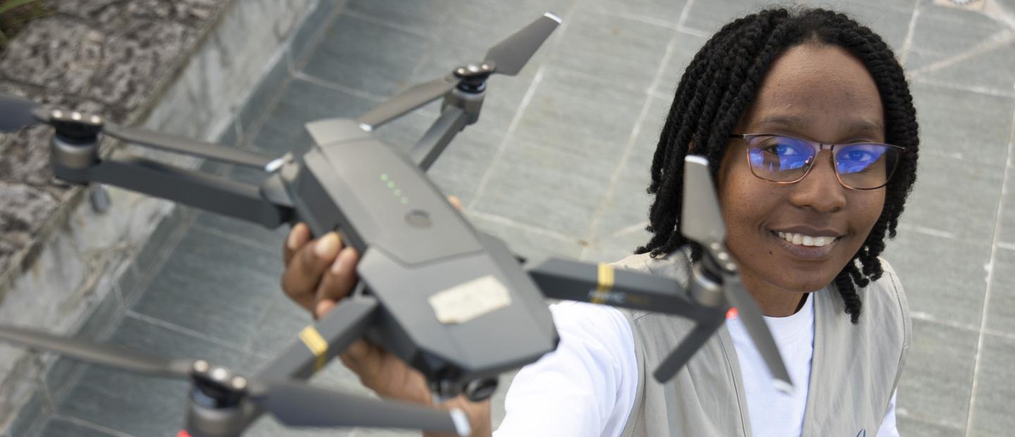 woman holding drone