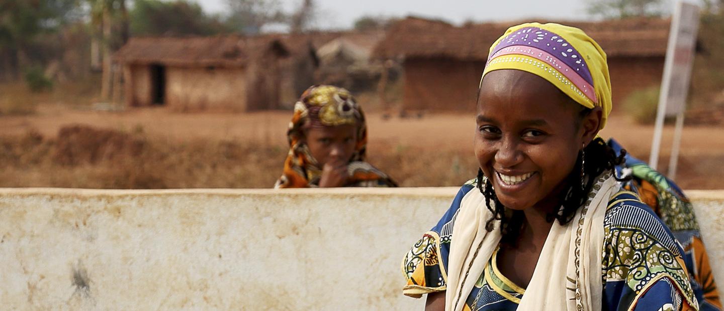A girl smiling.