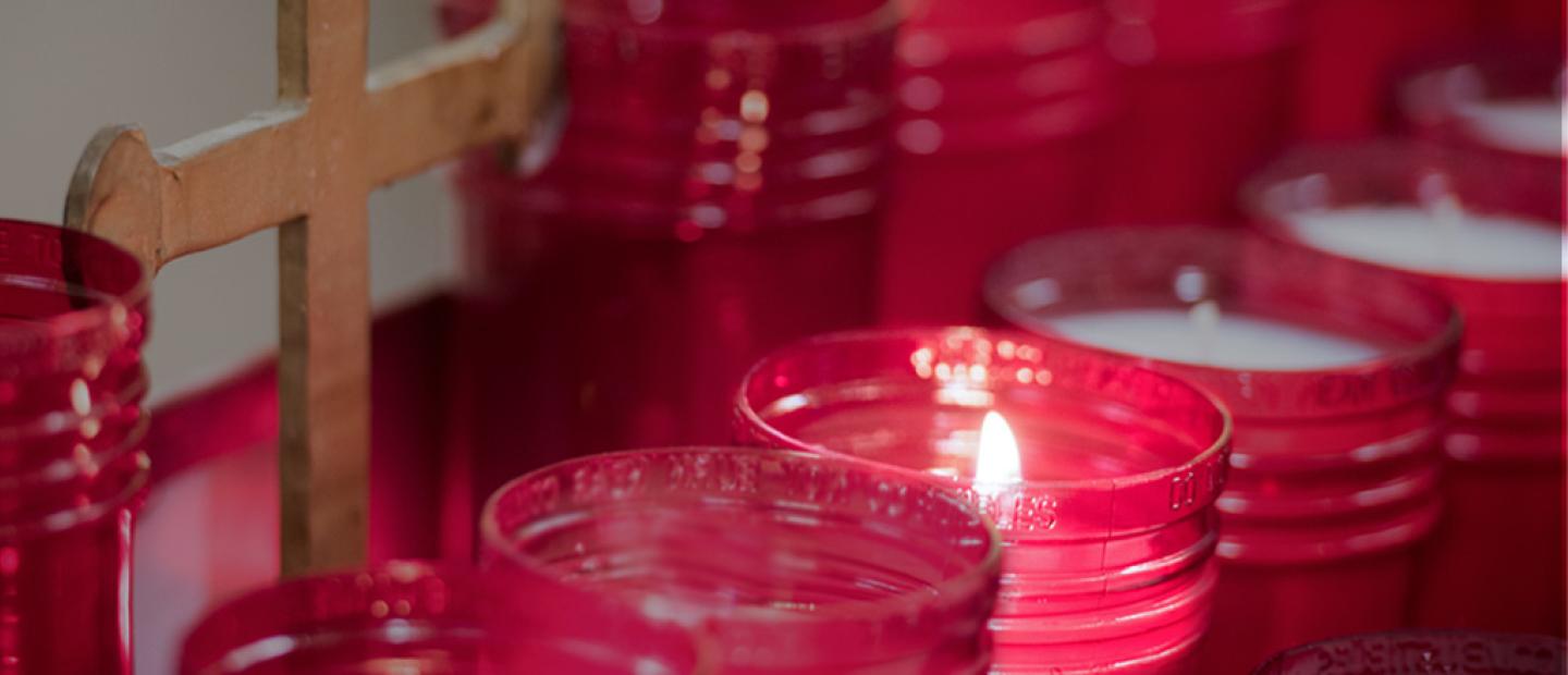 Candles and a cross.