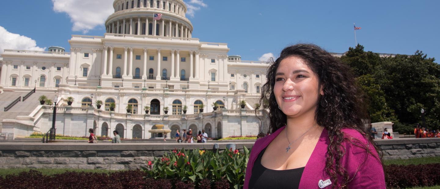 woman in front of Capitol building in Washington, DC