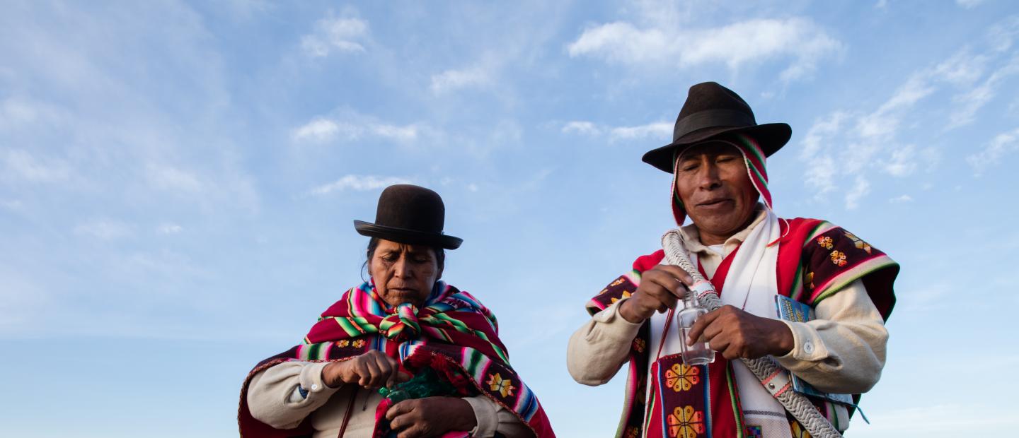 man and woman in indigenous clothing