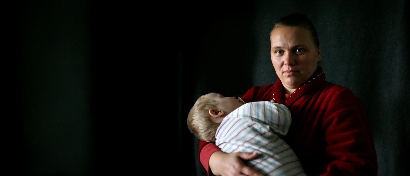 mother holding her baby