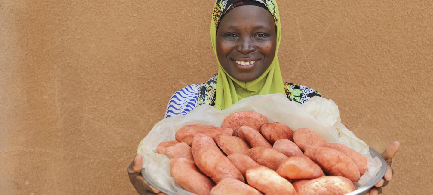 close portrait of smiling woman in Benin