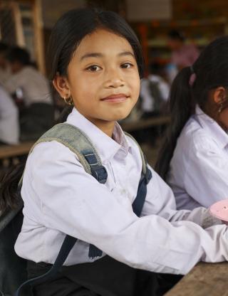 girl eating school lunch