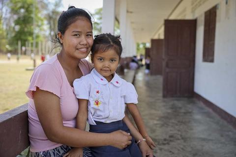 child on mother's lap
