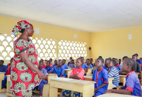 teacher addresses students in a classroom in Cameroon