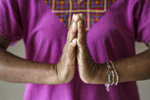 close up of woman's hands in prayer