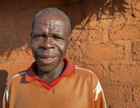 portrait of Central African Republic farmer outside his home