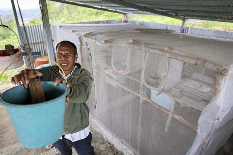 A man in a shelter.