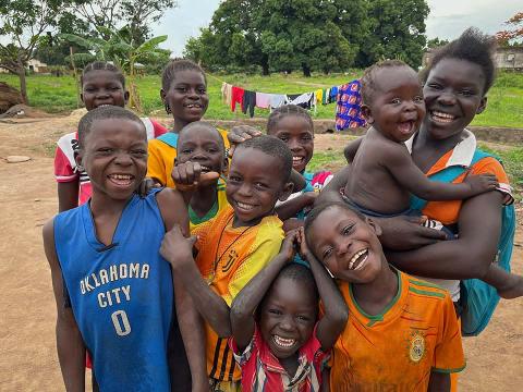 Children smiling for a picture.