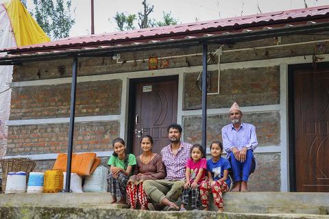 People sitting on steps.