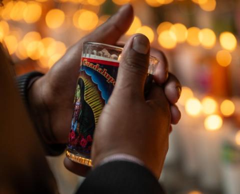 Person holding a candle