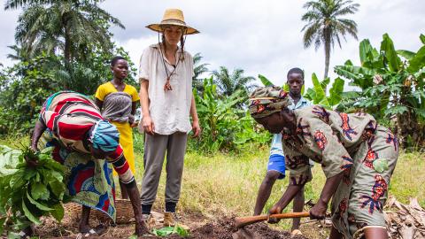 People planting seeds.