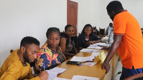 People in a meeting room.