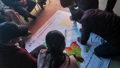 People looking at a map.