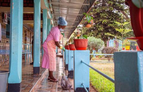 A woman cleaning floors.